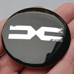 1 szt. aluminiowe emblematy na dekielki, naklejki logo Dacia 56 mm Rabat