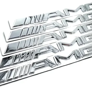 Zwrot pieniędzy EMBLEMAT ZNACZEK KLAPY TYLNEJ BAGAŻNIKA AMG MERCEDES SREBRNY