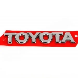 TOYOTA Corolla Chromowany emblemat logo tyl TOYOTA 75441-02040 OE Promocja