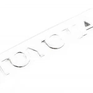 TOYOTA Avensis Chromowany emblemat logo tyl 75441-05090 OE Wysoka jakość