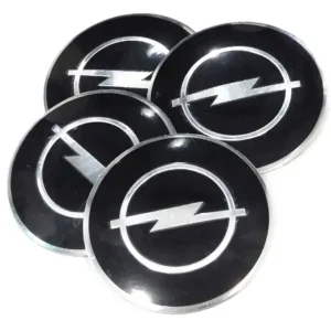 Rabat NAKLEJKI NA DEKIELKI ZAŚLEPKI DO OPEL LOGO ZNACZKI EMBLEMATY 64mm CZARNE