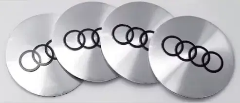 AUDI NAKLEJKI EMBLEMATY ZNACZKI LOGO ALUMINIM 56mm NA KOŁPAKI DEKIELKI Zamów teraz